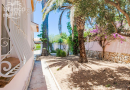 LARGE SEA VIEW VILLA WITH PRIVATE TENNIS COURT WALKING DISTANCE FROM MORAIRA TOWN CENTRE.